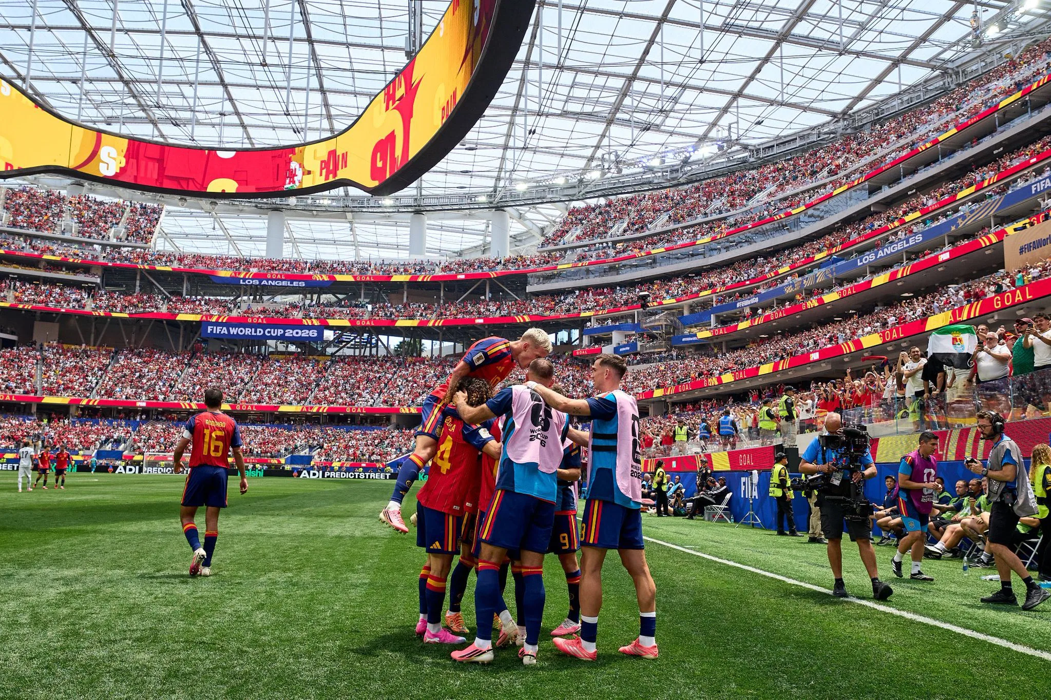 Spain beat Austria 3-0 to reach World Cup last 16